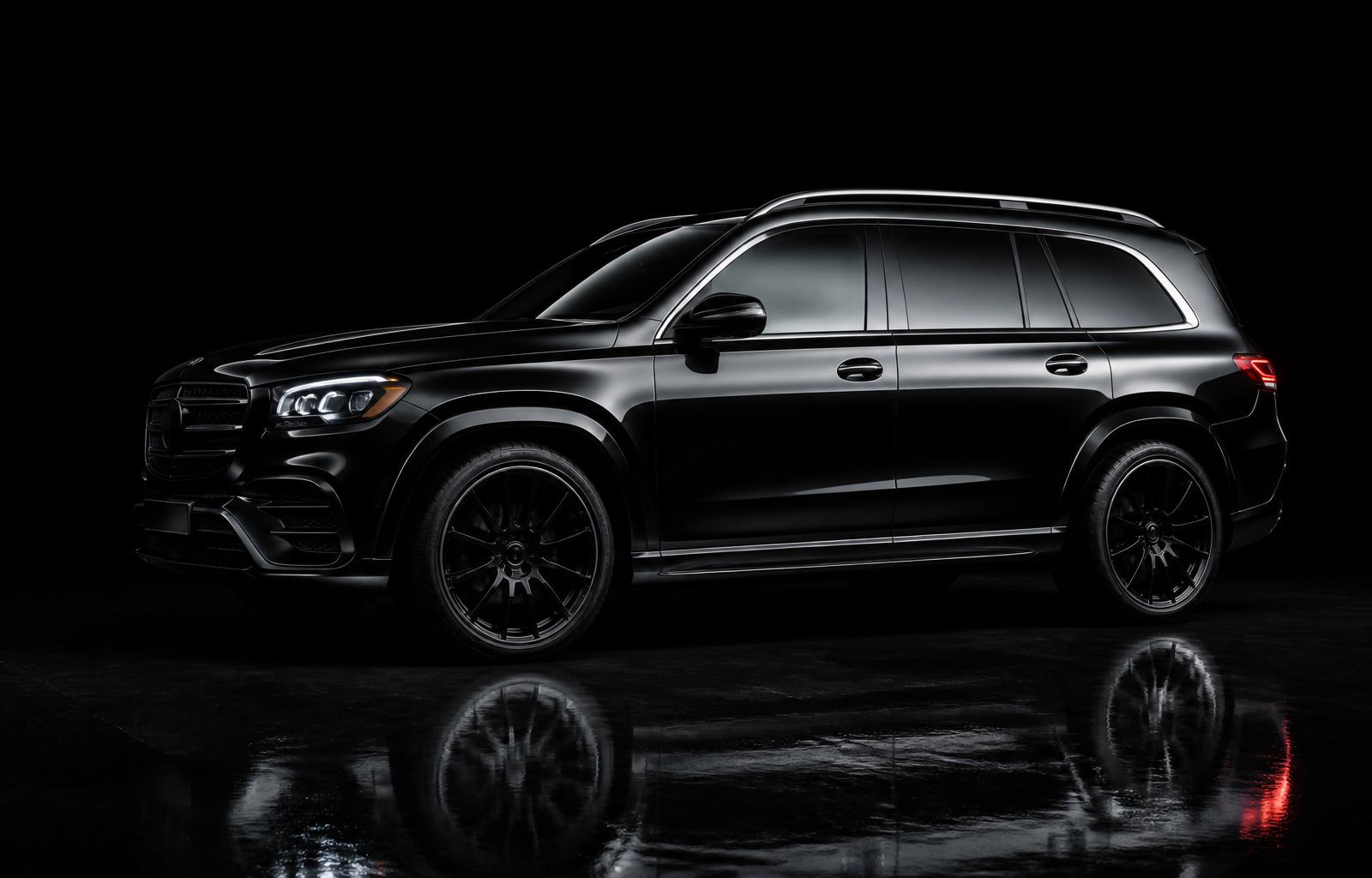 Mercedes-Benz GLS — black chauffeur vehicle, profile view